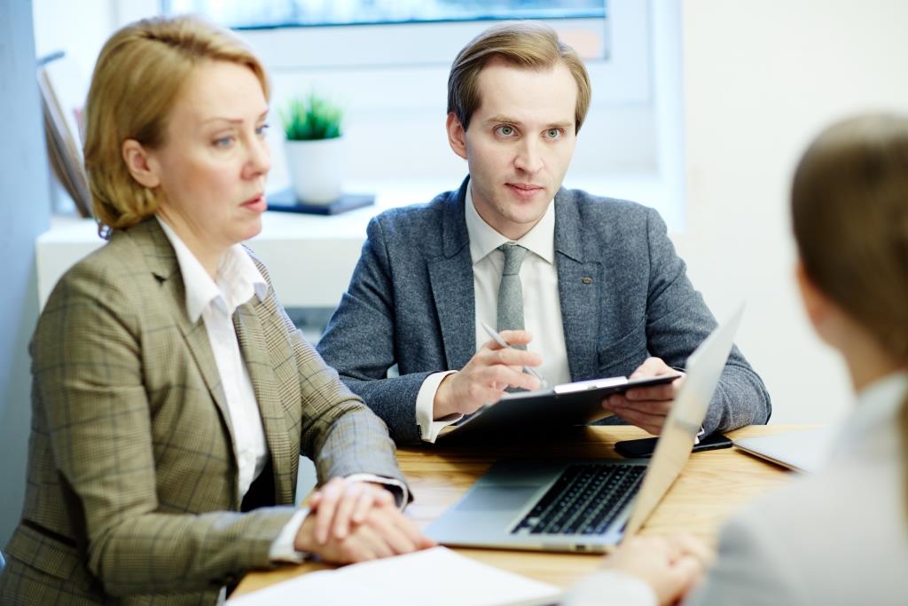 Business people arranging an interview at office