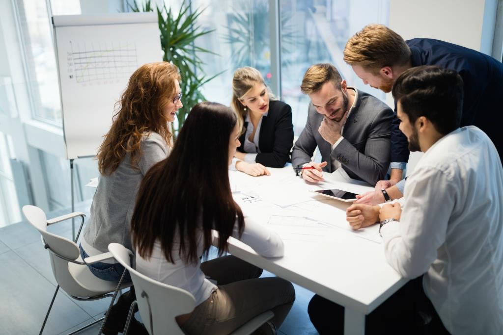 Business meeting and cooperation by business people in office